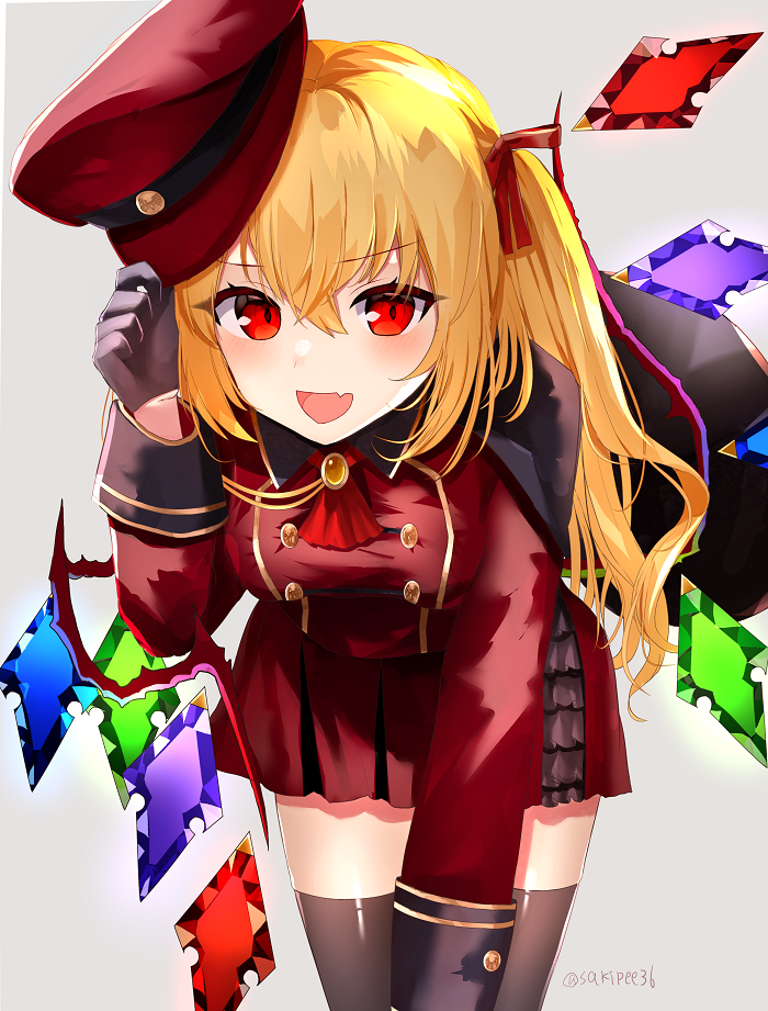 1girl :d arm_up black_gloves black_legwear blonde_hair blush brooch cape commentary cowboy_shot cravat eyebrows_visible_through_hair fang flandre_scarlet gloves grey_background hair_between_eyes hat hat_removed headwear_removed holding holding_clothes holding_hat jacket jewelry leaning_forward long_sleeves looking_at_viewer military military_hat military_uniform miniskirt one_side_up open_mouth pleated_skirt red_eyes red_jacket red_neckwear red_skirt sakizaki_saki-p short_hair simple_background skin_fang skirt sleeve_cuffs smile solo thigh-highs touhou tunic twitter_username uniform wings zettai_ryouiki