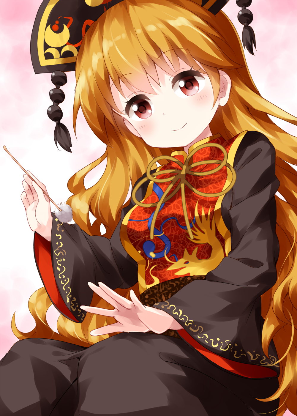 1girl bangs black_dress closed_mouth cotton_swab crescent crescent_moon dress eyebrows_visible_through_hair headdress highres holding junko_(touhou) long_hair long_sleeves looking_at_viewer moon orange_hair pink_background red_eyes ruu_(tksymkw) smile solo tabard tassel touhou wide_sleeves