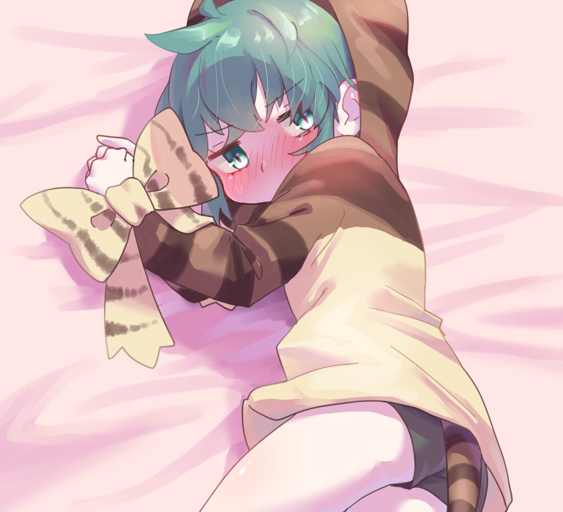 1girl black_shorts blue_hair blush bow cowboy_shot embarrassed eyebrows_visible_through_hair green_eyes hood hoodie kemono_friends nose_blush nyan_drow on_bed print_hoodie short_hair shorts snake_print snake_tail solo tail tsuchinoko_(kemono_friends)