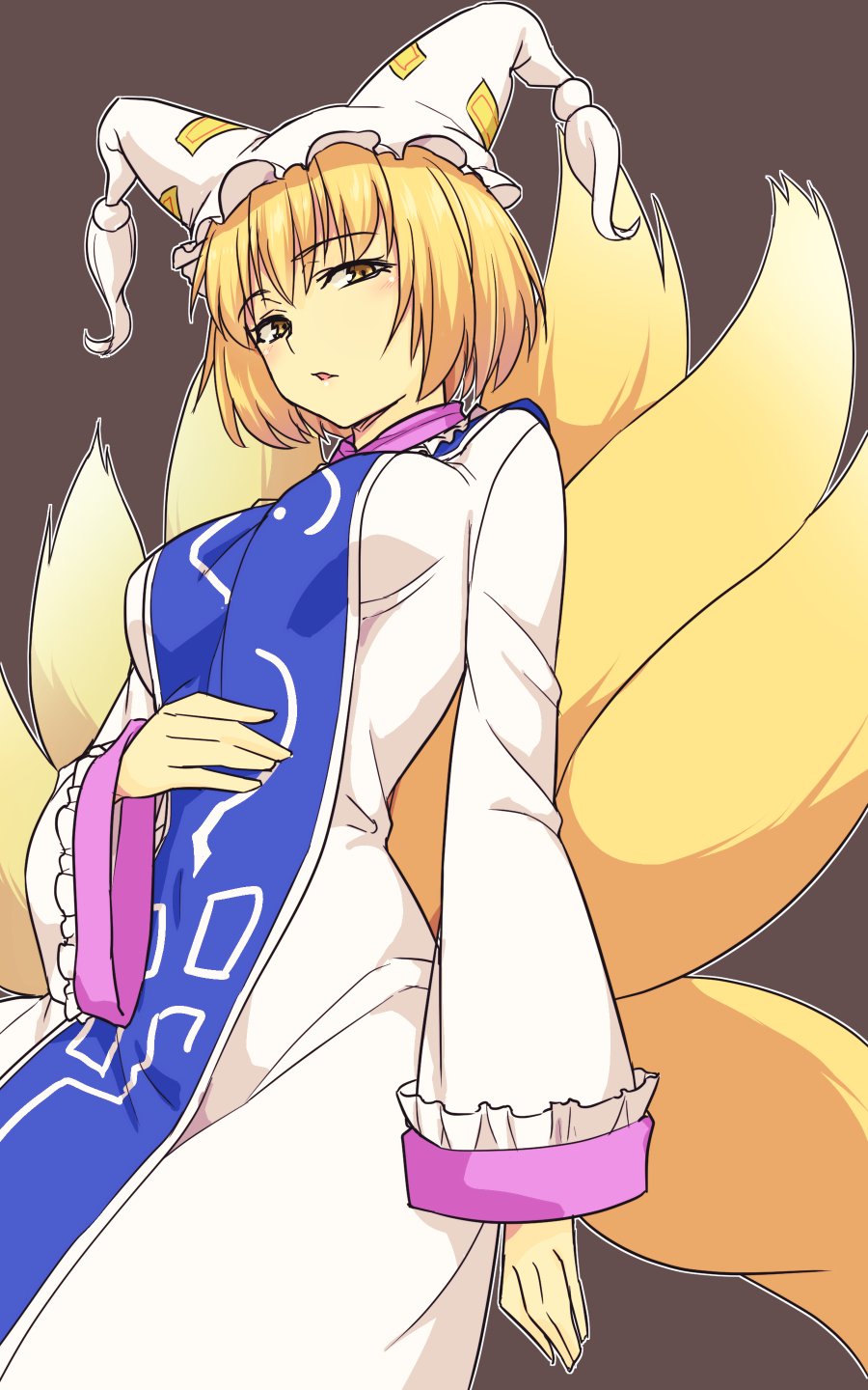 1girl bangs blonde_hair breasts cowboy_shot dark_background dress eyebrows_visible_through_hair fox_tail hat highres kakone large_breasts long_sleeves looking_at_viewer multiple_tails open_mouth pillow_hat short_hair simple_background solo standing tabard tail touhou white_dress white_headwear yakumo_ran yellow_eyes yellow_tail