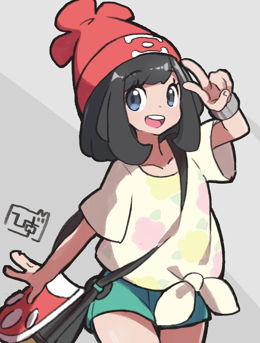 1girl beanie black_hair collarbone eyebrows_visible_through_hair green_shorts grey_background hat hiisu_(s-1104-d) jewelry looking_at_viewer pokemon pokemon_(game) pokemon_sm red_headwear ring selene_(pokemon) shirt short_shorts short_sleeves shorts signature simple_background smile solo upper_teeth v