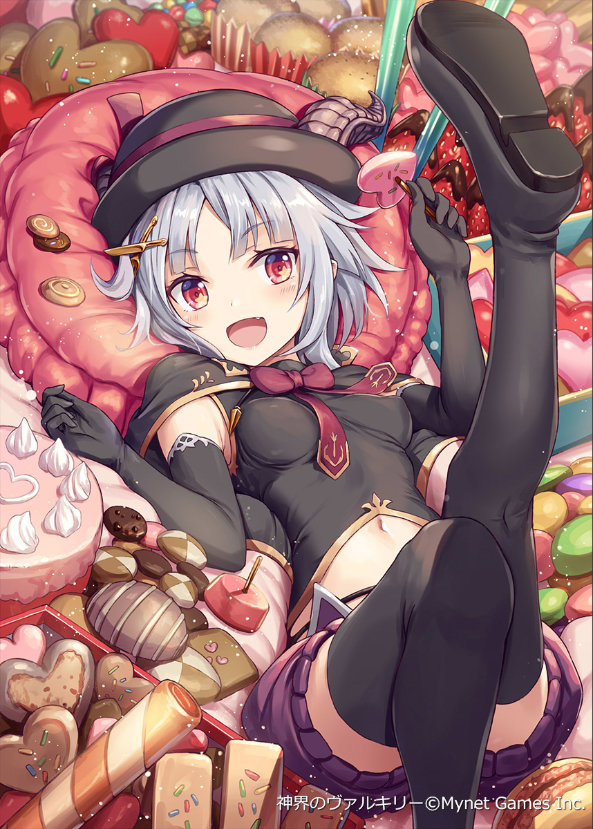 1girl :d akkijin armpit_crease black_gloves black_headwear black_legwear black_shirt bow bowtie breasts cake candy capelet chocolate chocolate_heart cookie crop_top elbow_gloves fang fedora food gloves gold_trim hands_up hat heart highres knee_up leg_up looking_at_viewer lying medium_breasts midriff navel official_art on_back open_mouth pillow purple_shorts red_eyes shinkai_no_valkyrie shirt short_hair shorts silver_hair sleeveless sleeveless_shirt smile solo thigh-highs wafer_stick