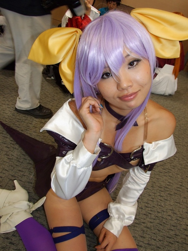 brabelt cosplay dizzy guilty_gear hair_bows onihara_akira open_dress purple_hair thigh-highs under_boob