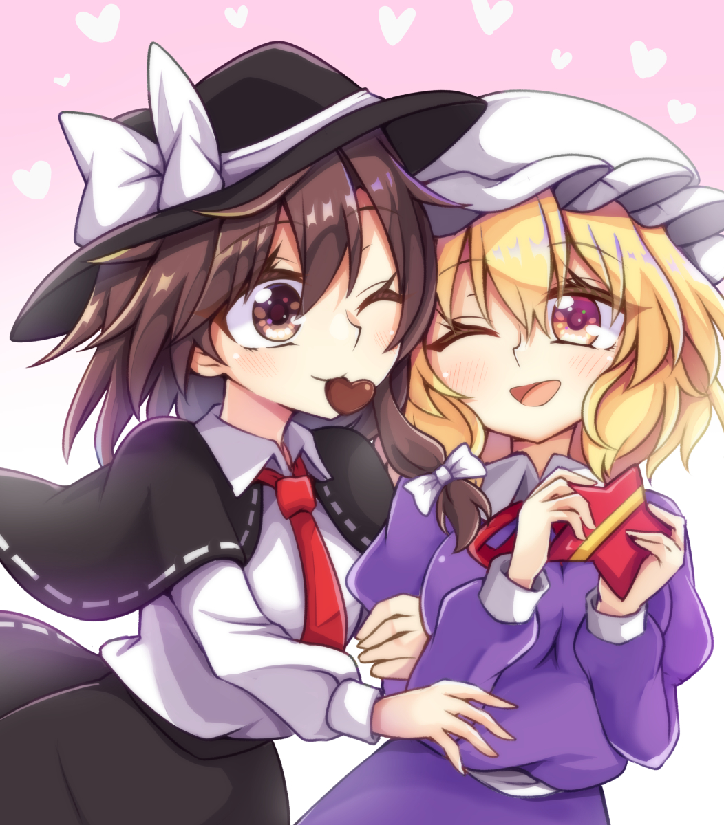 2girls :d arms_up black_capelet black_headwear black_skirt blonde_hair breasts brown_eyes brown_hair candy capelet chocolate chocolate_heart commentary_request cowboy_shot dress dress_shirt eyebrows_visible_through_hair food hair_between_eyes hat hat_ribbon heart heart_background highres juliet_sleeves keyaki_chimaki long_sleeves looking_at_another maribel_hearn medium_breasts mob_cap mouth_hold multiple_girls one_eye_closed open_mouth pink_background puffy_sleeves purple_dress red_neckwear ribbon shirt short_hair single_sidelock skirt smile standing star-shaped_box touhou usami_renko valentine violet_eyes white_headwear white_shirt