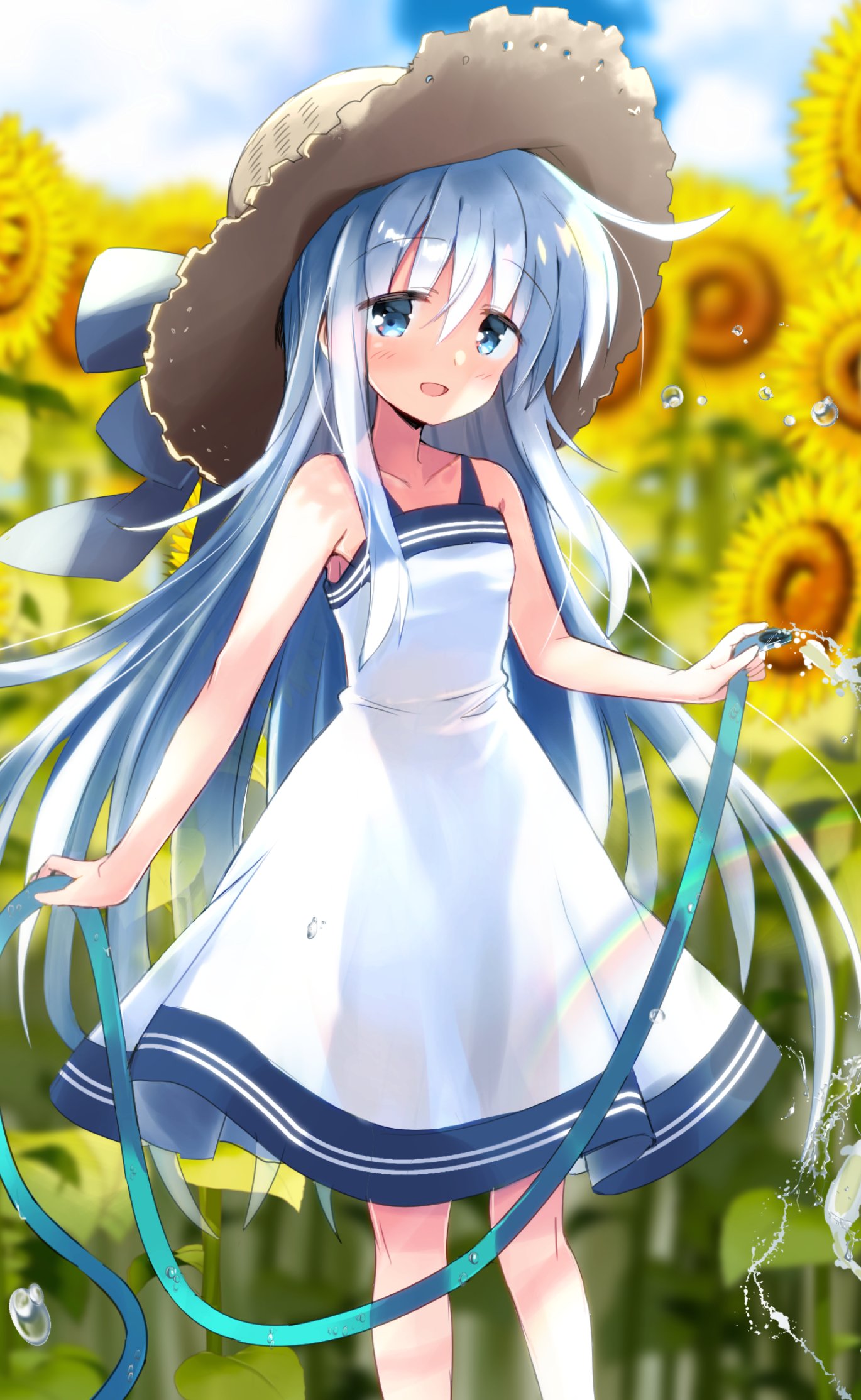 1girl bangs blue_eyes blurry blurry_background blush brown_headwear clouds commentary_request day dress eyebrows_visible_through_hair flower hat hibiki_(kancolle) highres hizuki_yayoi holding holding_hose hose kantai_collection long_hair open_mouth outdoors rainbow silver_hair sky solo sun_hat sunflower water white_dress yellow_flower