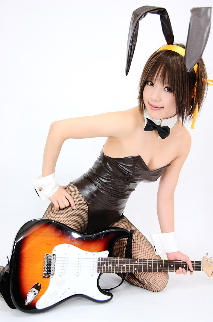 animal_ears rabbit_ears cleavage cosplay fishnet_stockings guitar hair_ribbons hairband kipi-san photo suzumiya_haruhi suzumiya_haruhi_no_yuuutsu