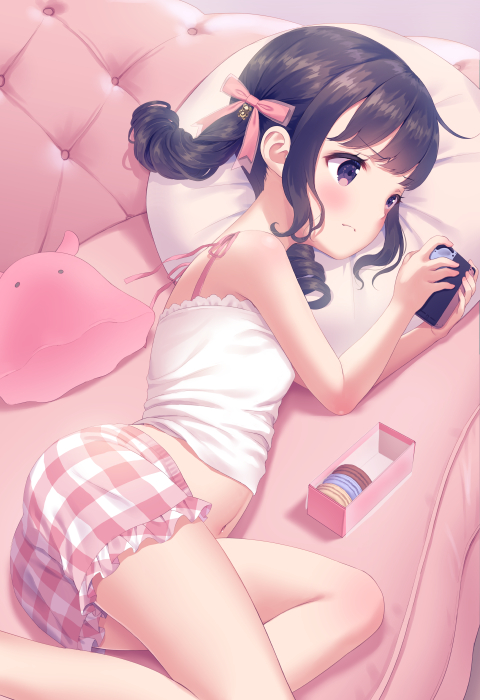 1girl ass bangs bare_arms bare_shoulders black_hair bow brown_eyes camisole child chitosezaka_suzu commentary_request eyebrows_visible_through_hair feet_out_of_frame food frilled_shorts frills hair_bow holding long_hair looking_away lying macaron midriff navel nintendo on_side original pillow pink_bow plaid plaid_shorts short_shorts shorts solo twintails white_camisole