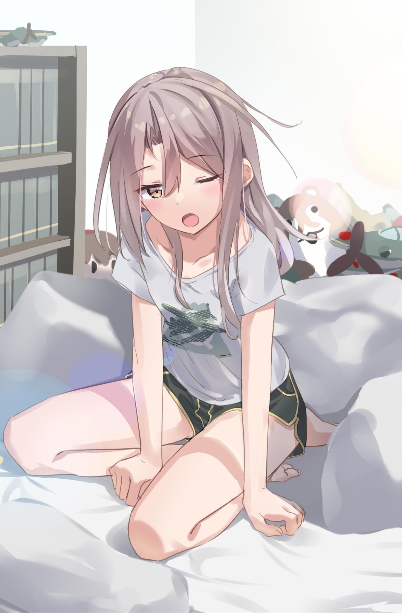 1girl aircraft airplane alternate_costume bed bokukawauso bookshelf brown_eyes commentary_request full_body green_shorts grey_hair highres kantai_collection long_hair looking_at_viewer natsuki_(gedo) one_eye_closed open_mouth otter shirt shorts sitting sleepwear solo stuffed_animal stuffed_otter stuffed_toy t-shirt white_shirt yokozuwari zuihou_(kancolle)