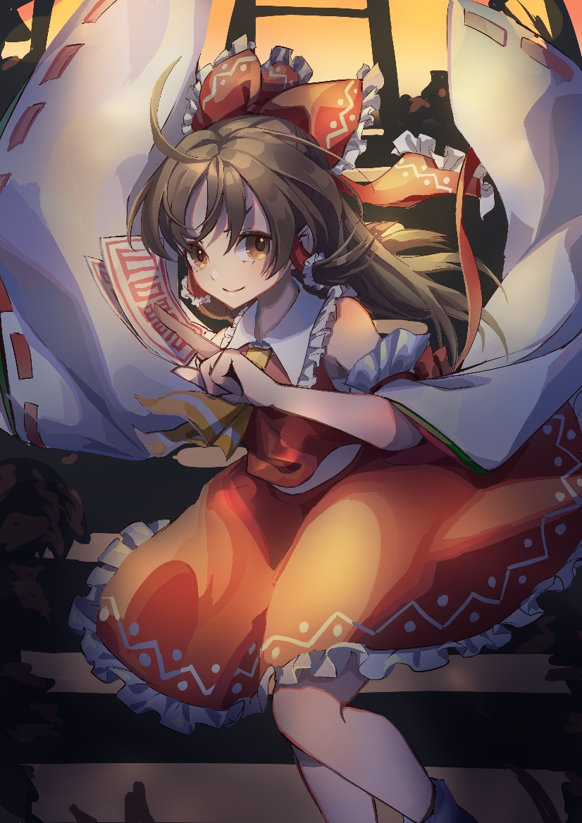 1girl ahoge ascot bangs bare_shoulders between_fingers bow breasts brown_eyes brown_hair closed_mouth detached_sleeves eyebrows_behind_hair feet_out_of_frame frilled_bow frilled_hair_tubes frilled_shirt_collar frills hair_bow hair_tubes hakurei_reimu long_hair looking_at_viewer myuga66666 ofuda orange_sky outdoors petticoat red_skirt red_vest skirt sky small_breasts smile solo stairs torii touhou twilight v-shaped_eyebrows vest wide_sleeves yellow_neckwear