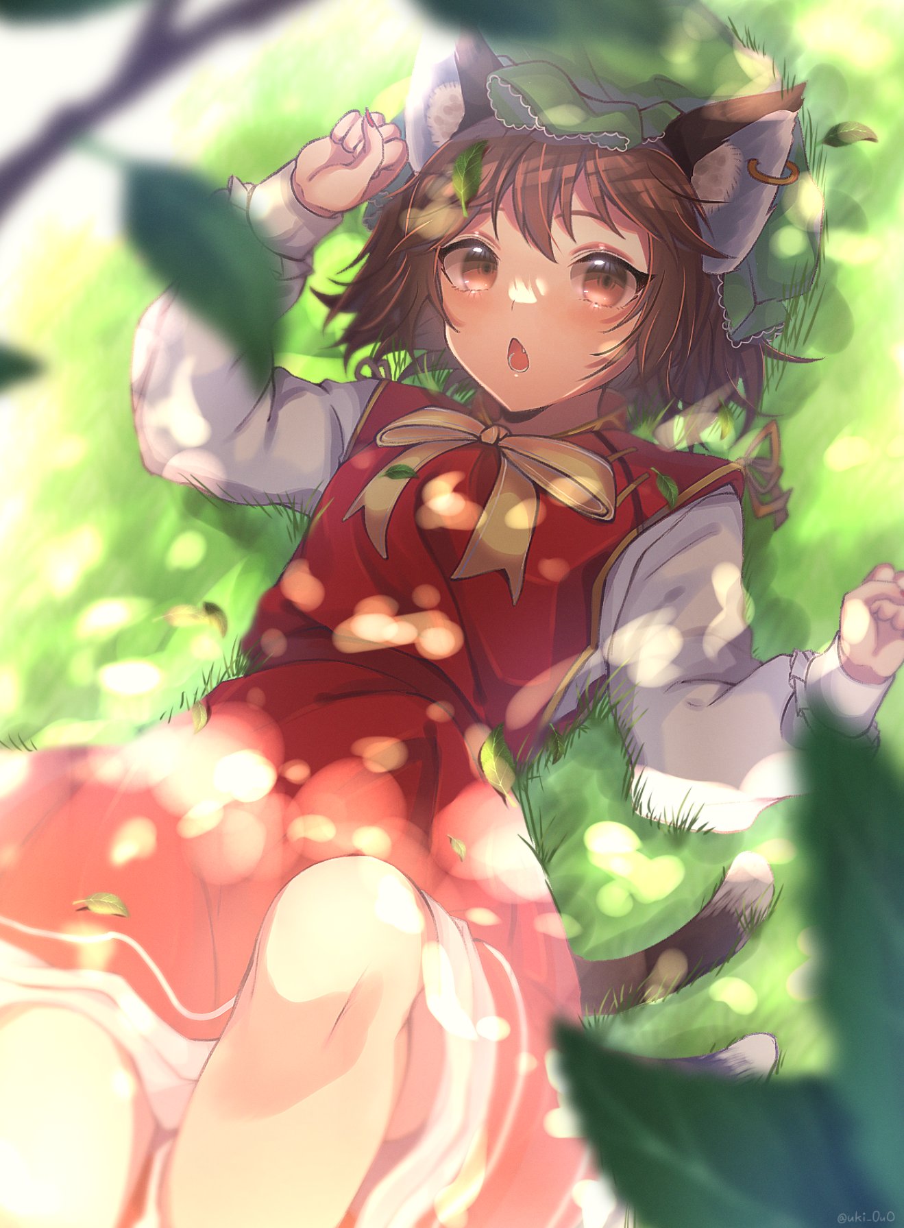 1girl :o animal_ear_fluff animal_ears bangs blurry blush bow bowtie branch brown_eyes brown_hair cat_ears cat_tail chen dappled_sunlight day depth_of_field dress earrings feet_out_of_frame gold_trim grass green_headwear hat highres jewelry knee_up leaf long_sleeves looking_at_viewer lying mob_cap multiple_tails nekomata on_back open_mouth outdoors red_dress short_hair single_earring solo sunlight tail touhou two_tails yellow_bow yellow_neckwear yuxi