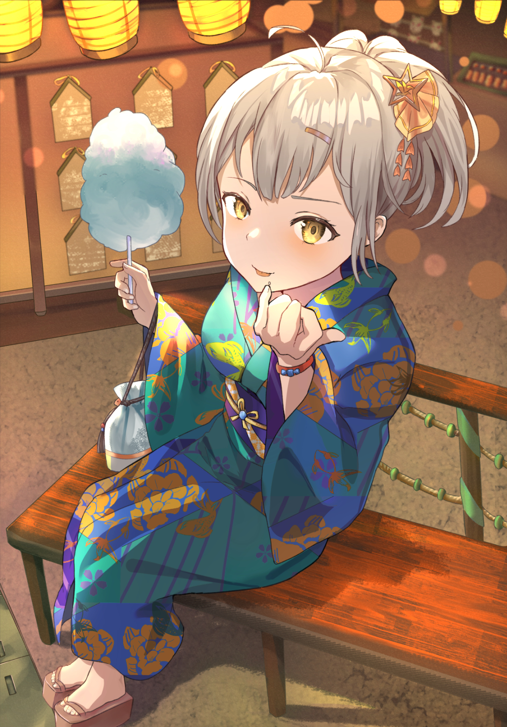 1girl :p ahoge bangs blue_kimono brown_footwear closed_mouth cotton_candy floral_print food food_on_face grey_hair hair_ornament hairclip hands_up highres holding holding_food japanese_clothes kimono lantern long_sleeves looking_at_viewer mosta_(lo1777789) obi on_bench original paper_lantern platform_footwear ponytail print_kimono sash sitting smile solo star_(symbol) star_hair_ornament tongue tongue_out wide_sleeves yellow_eyes zouri