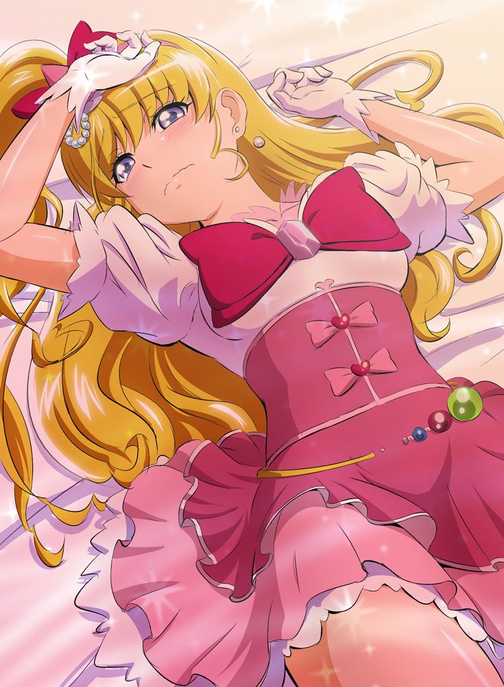 1girl arm_up bangs bed_sheet blonde_hair blush bow bowtie closed_mouth cure_miracle earrings eyebrows_visible_through_hair from_above fuchi_(nightmare) gloves hair_between_eyes hair_bow hat high_ponytail jewelry layered_skirt long_hair lying mahou_girls_precure! mini_hat miniskirt multicolored multicolored_clothes multicolored_skirt on_back pink_bow pink_headwear pink_shirt pink_skirt precure red_bow red_neckwear red_skirt shiny shiny_hair shiny_skin shirt short_sleeves side_ponytail skirt solo underbust very_long_hair violet_eyes wavy_mouth white_gloves white_skirt witch_hat