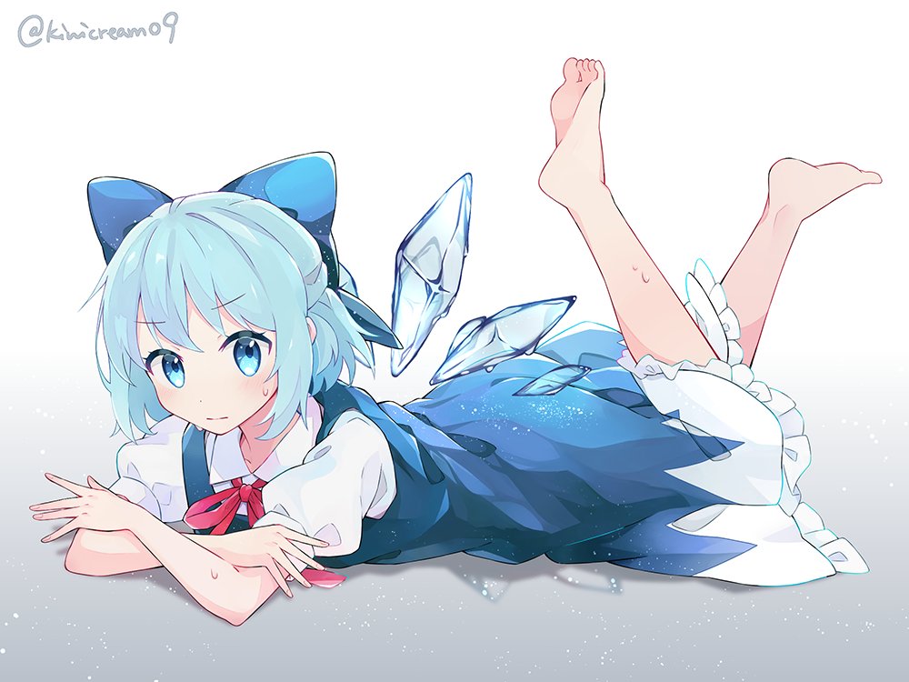 bangs barefoot blue_bow blue_dress blue_eyes blue_hair bow cirno commentary_request detached_wings dress feet_up full_body gradient gradient_background grey_background hair_bow ice ice_wings kiwicream09 looking_at_viewer lying neck_ribbon on_stomach red_neckwear ribbon shirt short_hair short_sleeves sweat touhou twitter_username white_background white_shirt wings