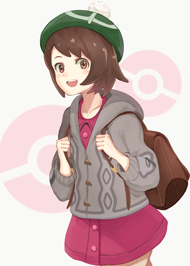 1girl backpack bag bangs blush bob_cut brown_bag brown_eyes brown_hair buttons cable_knit cardigan collared_dress commentary cowboy_shot dress gloria_(pokemon) green_headwear grey_cardigan hat holding_strap hooded_cardigan long_sleeves looking_at_viewer open_mouth pink_dress poke_ball pokemon pokemon_(game) pokemon_swsh pom_pom_(clothes) purea short_hair smile solo tam_o'_shanter white_background