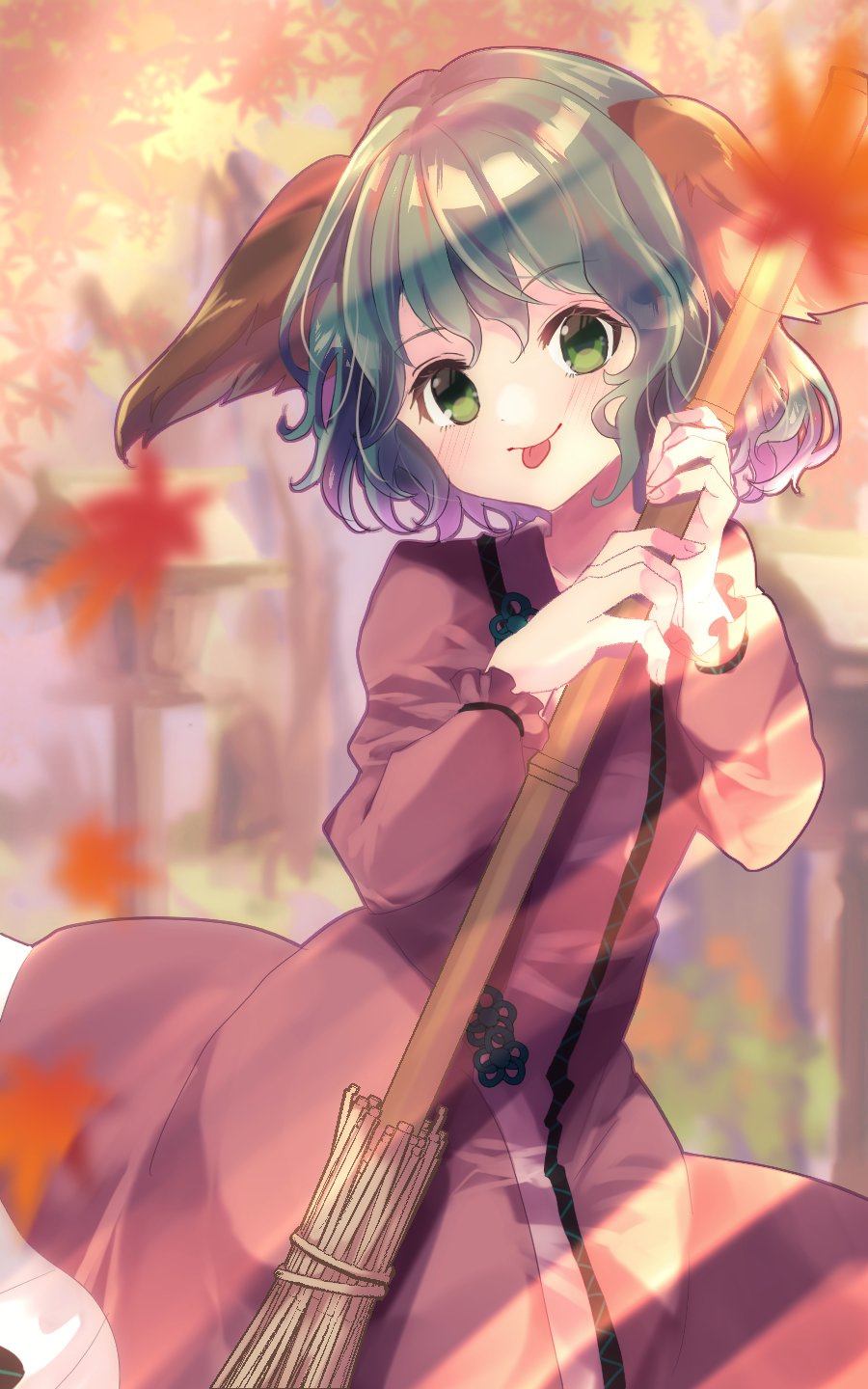1girl animal_ears autumn_leaves bangs blurry blurry_background blush broom commentary_request dappled_sunlight dog_ears dress green_eyes green_hair highres holding holding_broom kasodani_kyouko long_sleeves looking_at_viewer one-hour_drawing_challenge oudondk pink_dress shiny shiny_hair short_hair solo sunlight tongue tongue_out touhou tree upper_body yamabiko