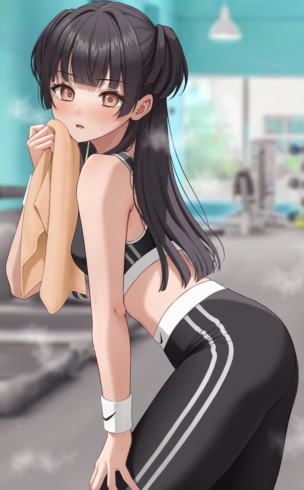 1girl ass bangs bare_shoulders black_hair black_pants black_sports_bra blunt_bangs blunt_ends blurry blurry_background blush breasts brown_eyes commentary eyebrows_visible_through_hair from_side gym highres holding holding_towel idolmaster idolmaster_shiny_colors leaning_forward logo long_hair looking_at_viewer mayuzumi_fuyuko nike pants small_breasts sports_bra steaming_body striped sweat takio_(kani_sama) towel vertical_stripes wristband yoga_pants