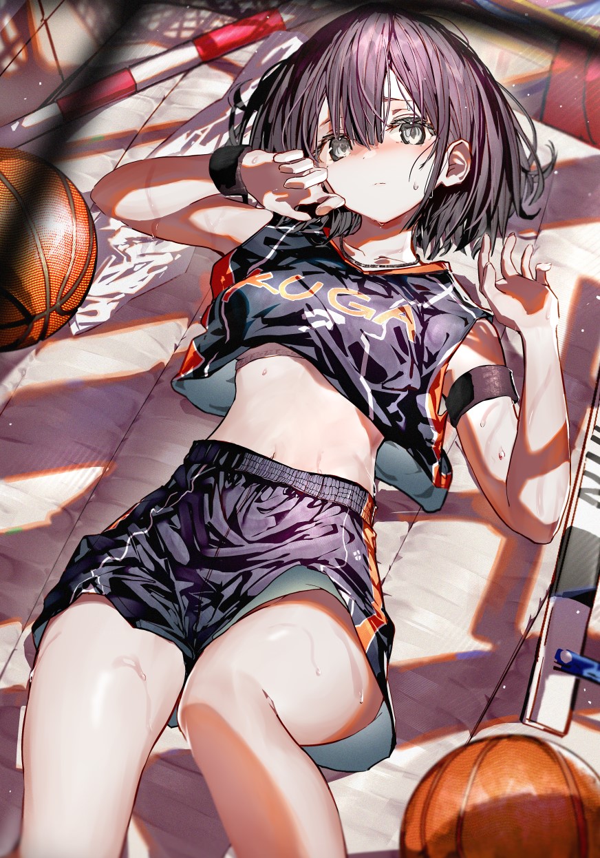1girl armlet bangs basketball basketball_uniform black_hair breasts closed_mouth commentary_request cowboy_shot day enj! from_above green_eyes hair_between_eyes highres looking_at_viewer lying medium_breasts midriff on_back original school_uniform short_hair solo sportswear sunlight sweat wiping_sweat