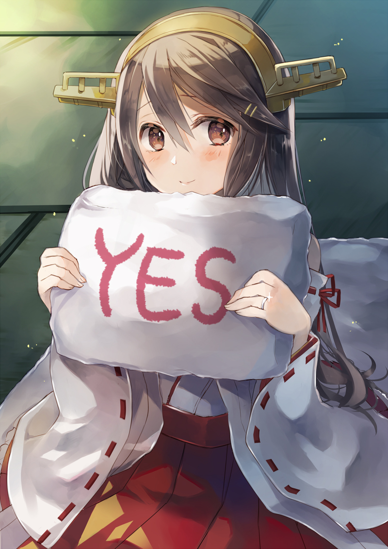 1girl black_hair brown_eyes commission detached_sleeves futon hair_ornament hairband hairclip haruna_(kancolle) hatomaru_(hatomaru56) headgear holding holding_pillow japanese_clothes jewelry kantai_collection long_hair nontraditional_miko pillow remodel_(kantai_collection) ribbon-trimmed_sleeves ribbon_trim ring sitting skeb_commission smile solo tatami wedding_band yes yes-no_pillow