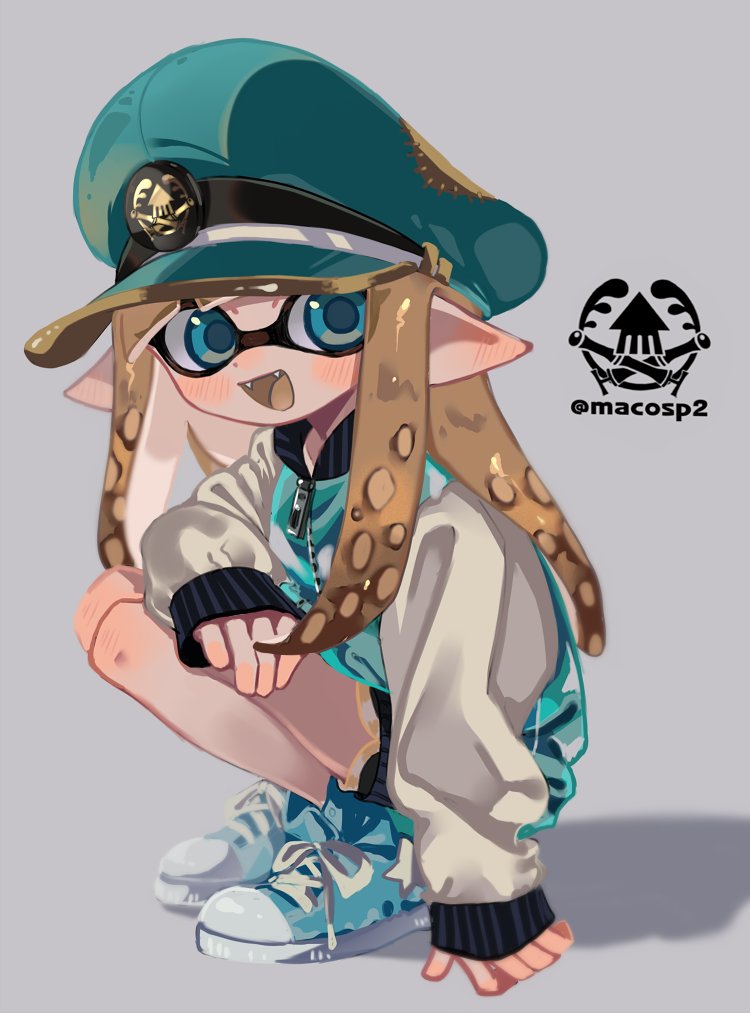 1girl blue_eyes blue_footwear blue_headwear blush brown_hair brown_tongue colored_tongue fangs hat inkling long_hair long_sleeves looking_at_viewer maco_spl open_mouth pointy_ears shoes smile sneakers solo splatoon_(series) squatting tentacle_hair