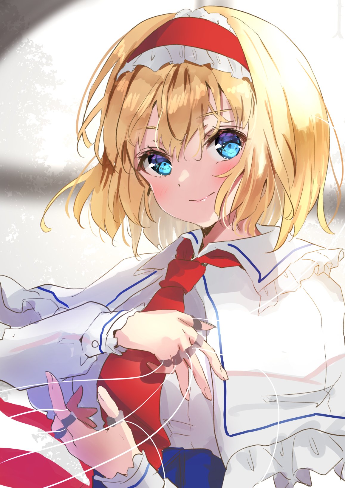 1girl :&gt; alice_margatroid bangs blonde_hair blue_eyes blush capelet eyebrows_visible_through_hair frilled_shirt_collar frills hair_between_eyes hairband highres jewelry looking_at_viewer necktie puppet_rings red_hairband red_necktie ring shironeko_yuuki short_hair solo touhou upper_body white_capelet