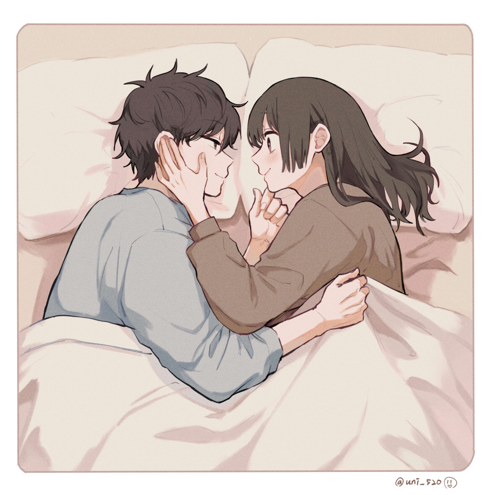 1boy 1girl blue_sweater blush brown_eyes brown_hair brown_sweater closed_mouth commentary couple dango_(uni_520) eye_contact hand_on_another's_face hetero indoors long_hair looking_at_another on_bed original pajamas pillow short_hair smile sweater under_covers