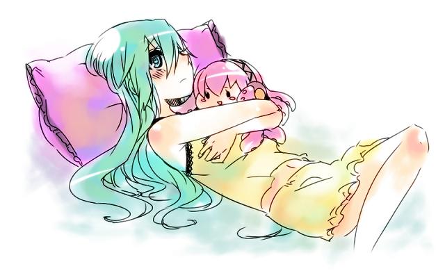 blush hatsune_miku lying megurine_luka miz_01 mizuki_(koko_lost) pillow pullow solo takoluka vocaloid