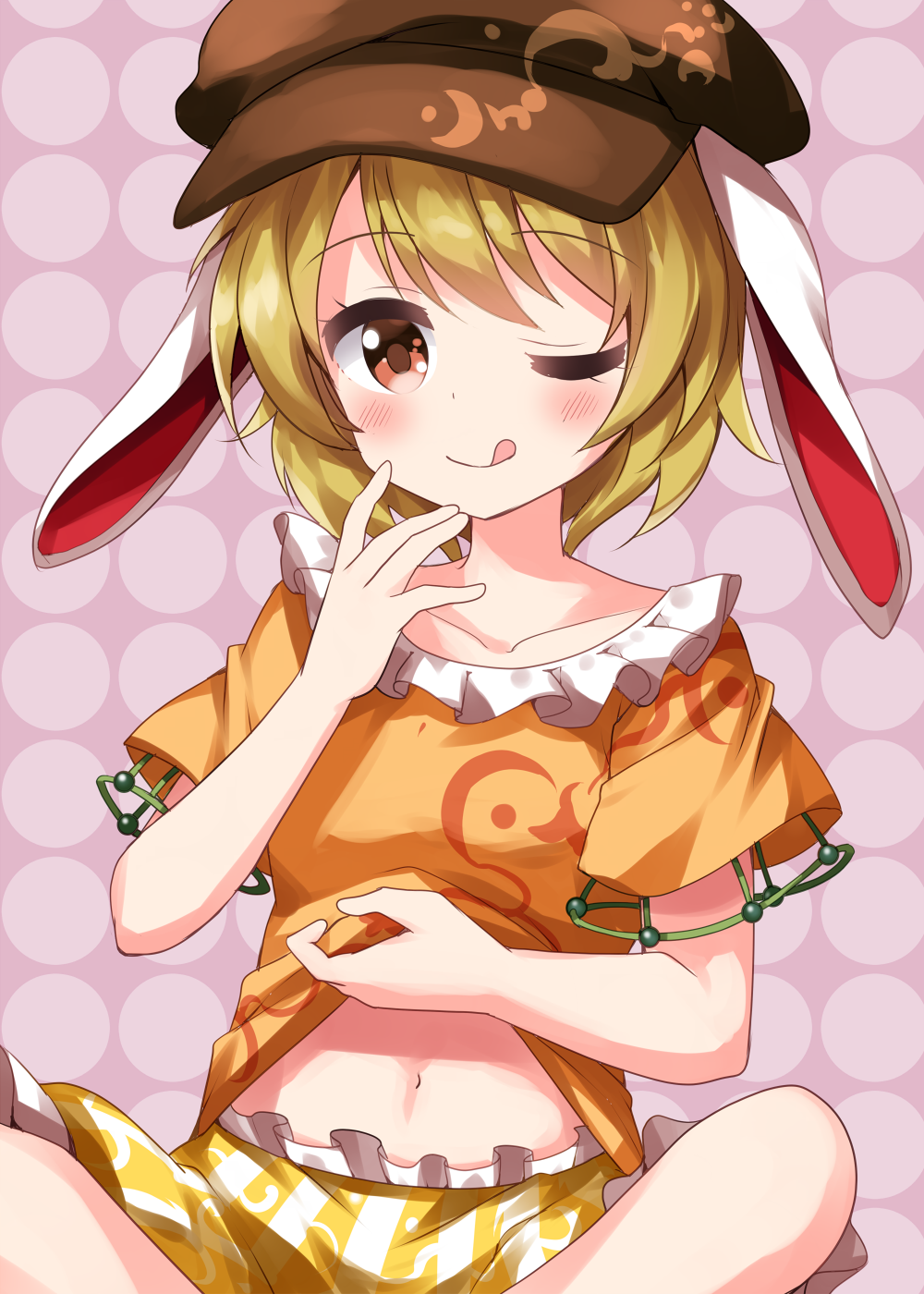 1girl animal_ears bangs blonde_hair blush breasts brown_headwear cabbie_hat closed_mouth clothes_lift collarbone eyebrows_visible_through_hair flat_cap floppy_ears frilled_shirt frilled_shorts frills hat highres indian_style looking_at_viewer midriff moon_rabbit navel one-hour_drawing_challenge one_eye_closed orange_shirt pink_background rabbit_ears red_eyes ringo_(touhou) ruu_(tksymkw) shirt shirt_lift short_hair short_sleeves shorts sitting small_breasts smile stomach striped striped_shorts tongue touhou yellow_shorts