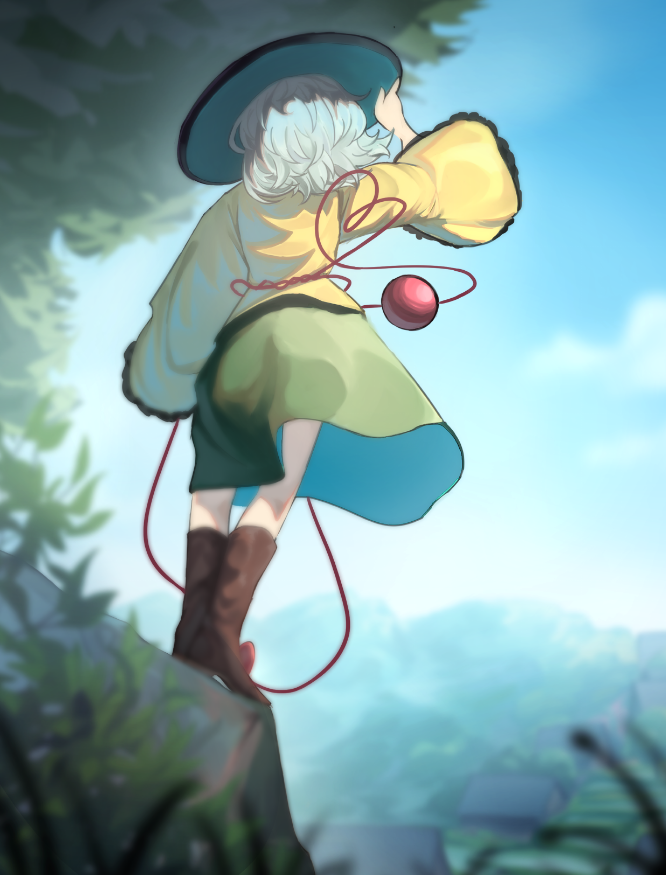 1girl blurry blurry_background blurry_foreground boots brown_footwear commentary_request dutch_angle frogsnake from_behind full_body green_skirt hat holding holding_clothes holding_hat house knee_boots komeiji_koishi mountain nature outdoors shirt skirt solo standing third_eye touhou white_hair wide_sleeves wind yellow_shirt