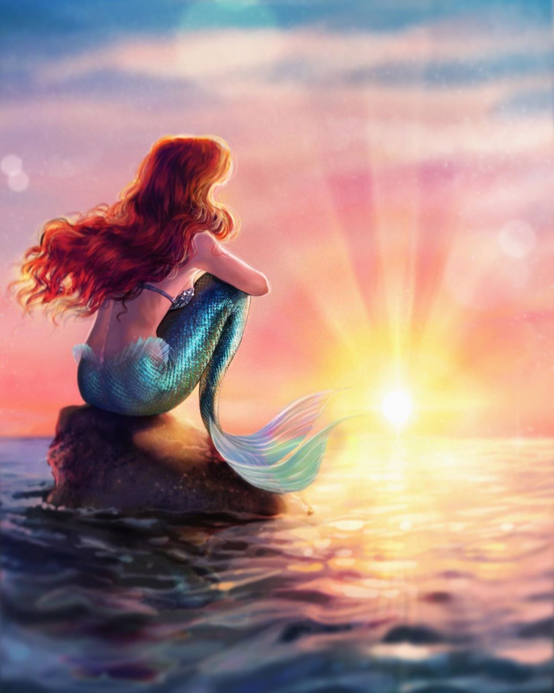 1girl ariel_(disney) fins from_behind highres long_hair lukaswerneck mermaid monster_girl ocean redhead scales shell shell_bikini sitting_on_rock sky solo sunlight sunset tail the_little_mermaid