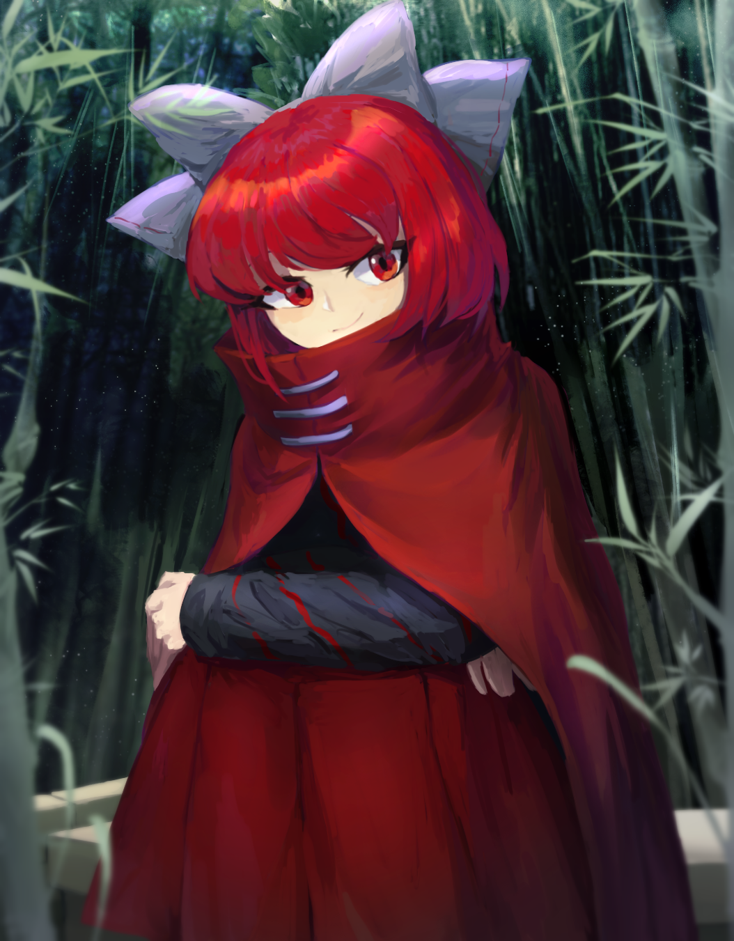 1girl bamboo bamboo_forest bangs black_shirt blue_bow bow cape closed_mouth commentary feet_out_of_frame forest hair_bow head_tilt highres hugging_own_legs long_sleeves looking_at_viewer medium_hair nature nova_(artist) red_cape red_eyes red_skirt redhead sekibanki shirt sitting skirt smile solo touhou