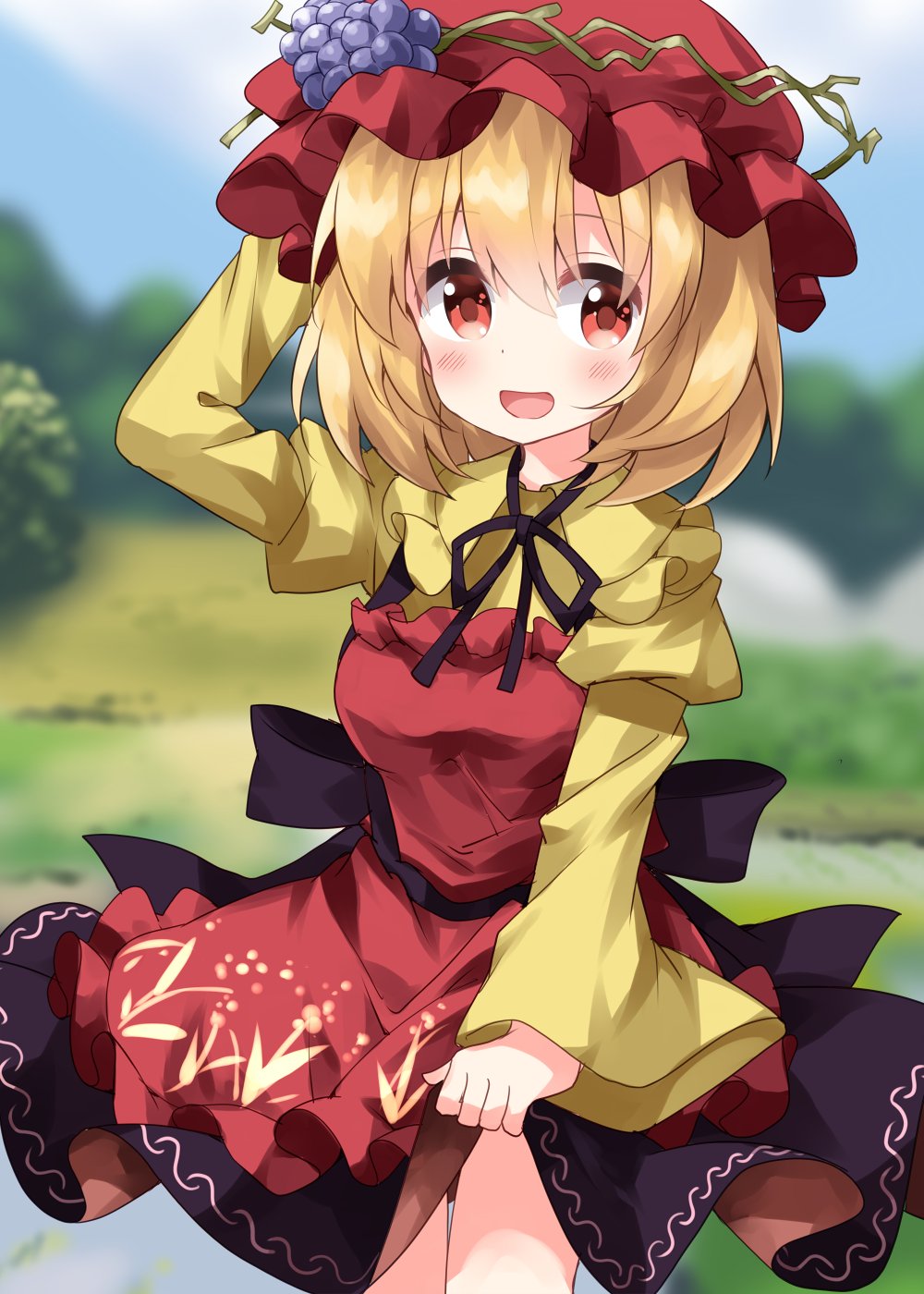 1girl aki_minoriko apron black_bow black_ribbon black_skirt blonde_hair bow breasts collared_shirt cowboy_shot food frilled_apron frilled_shirt_collar frills fruit grape_hat_ornament grapes hand_on_headwear happy highres juliet_sleeves long_sleeves medium_breasts neck_ribbon one-hour_drawing_challenge open_mouth orange_apron outdoors puffy_sleeves ribbon ruu_(tksymkw) shirt short_hair skirt skirt_hold solo touhou waist_bow wide_sleeves yellow_eyes yellow_shirt