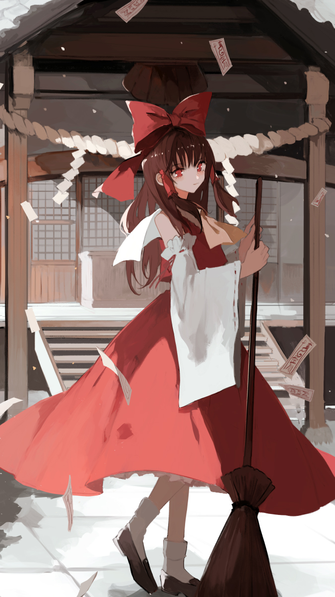 1girl asahiro ascot bangs bow broom brown_hair building closed_mouth commentary detached_sleeves full_body hair_bow hair_tubes hakurei_reimu highres holding holding_broom loafers long_hair ofuda red_bow red_eyes red_skirt red_vest ribbon-trimmed_sleeves ribbon_trim rope shimenawa shoes shrine skirt socks solo touhou vest white_sleeves white_socks wide_sleeves yellow_ascot