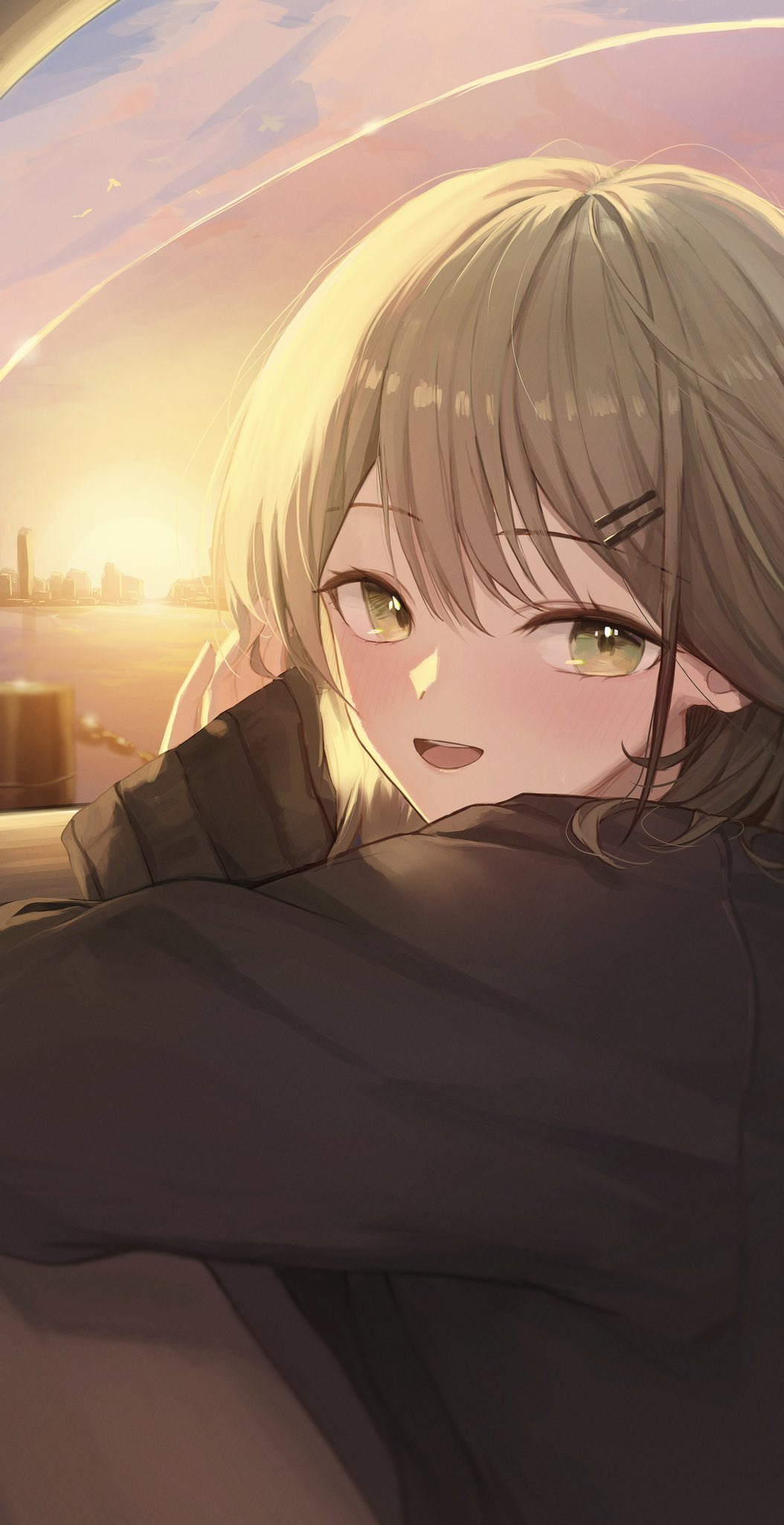 1girl bangs black_sweater blush brown_hair building gnns green_eyes green_hair hair_ornament hairclip highres long_sleeves looking_at_viewer medium_hair ocean open_mouth original oversized_clothes pink_sky shiny shiny_hair sleeves_past_fingers sleeves_past_wrists smile solo sunset sweater upper_body