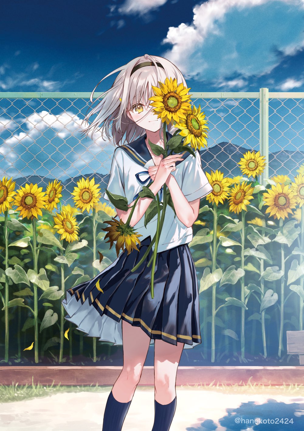 1girl blue_skirt blue_sky chain-link_fence clouds cloudy_sky commentary_request day fence flower grey_hair hairband hanekoto highres holding holding_flower looking_at_viewer original outdoors pleated_skirt sailor_collar school_uniform serafuku skirt sky solo standing sunflower twitter_username yellow_eyes