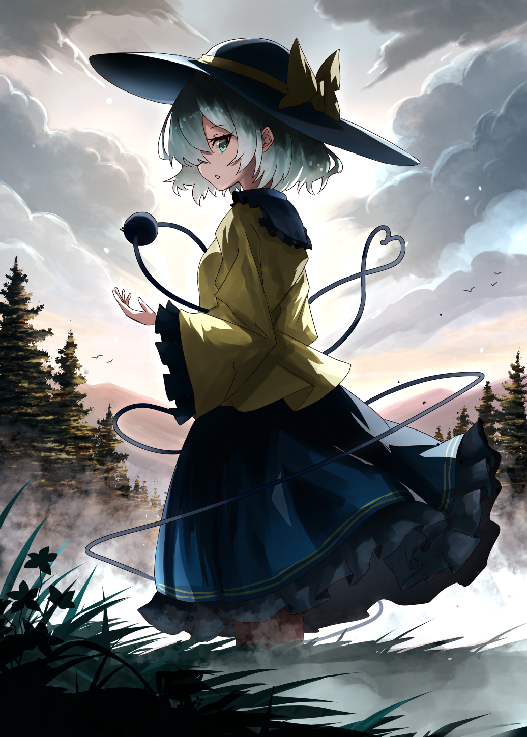 1girl black_headwear bow clouds commentary flower from_side grass green_eyes green_hair green_skirt hat hat_bow heart heart_of_string highres komeiji_koishi looking_at_viewer mountainous_horizon nanahana_nanana open_mouth outdoors shirt short_hair skirt solo third_eye touhou tree wide_sleeves yellow_bow yellow_shirt