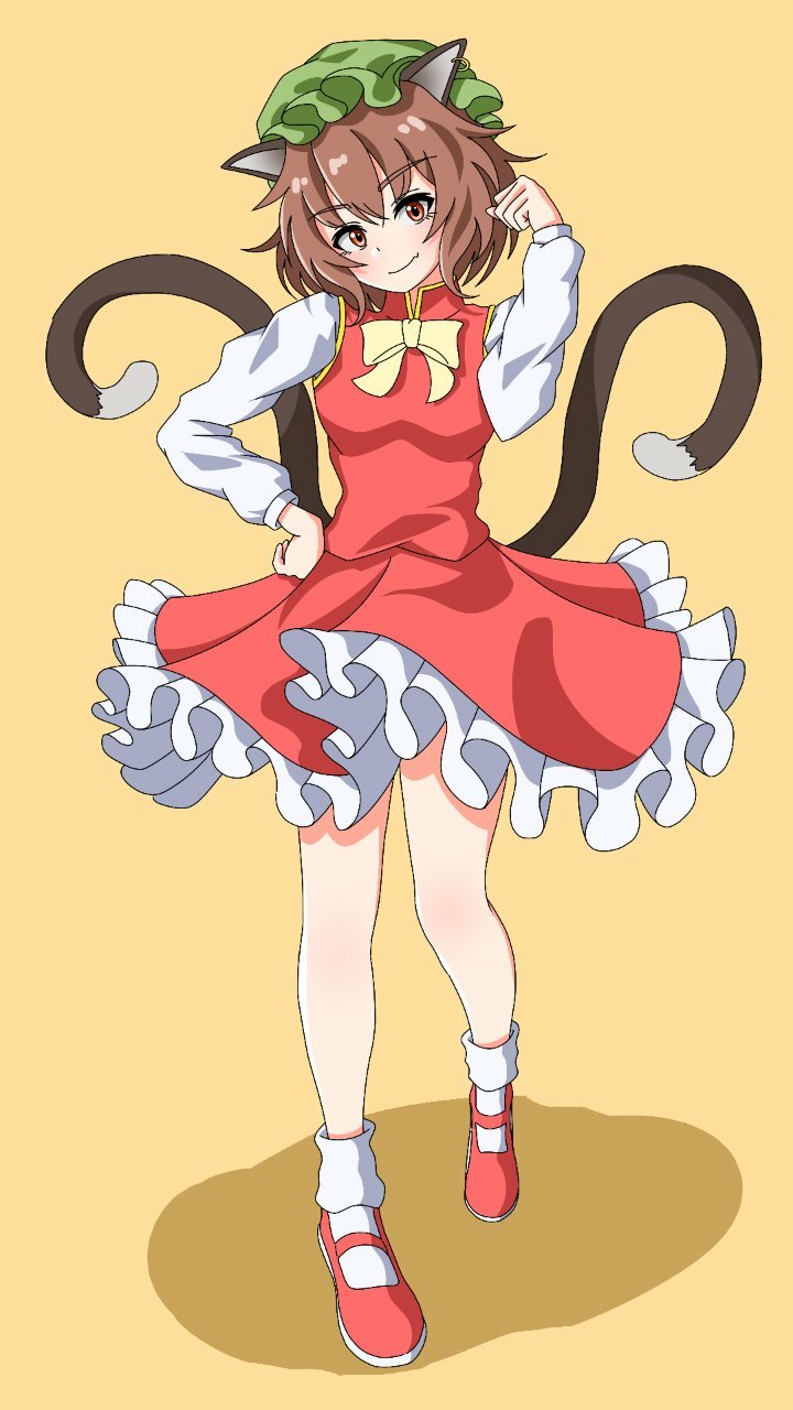 1girl animal_ears bare_legs bobby_socks bow bowtie breasts brown_background brown_eyes brown_hair cat_ears cat_tail chen closed_mouth commentary_request fang fang_out frills full_body gold_trim green_headwear hand_on_own_hip hand_up hat head_tilt highres light_blush light_smile long_sleeves looking_at_viewer mary_janes mob_cap multiple_tails nekomata petite petticoat puffy_long_sleeves puffy_sleeves red_footwear red_skirt red_vest shadow shoes short_hair simple_background skin_fang skirt skirt_set small_breasts socks solo standing tail touhou two_tails vest white_bow white_bowtie zheng3008451858