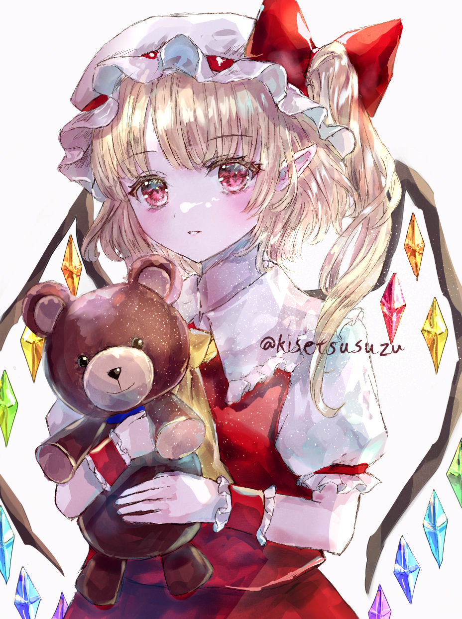 1girl ascot blonde_hair crystal flandre_scarlet hat hat_ribbon highres holding mob_cap multicolored_wings one_side_up puffy_short_sleeves puffy_sleeves red_eyes red_skirt ribbon short_sleeves side_ponytail skirt skirt_set solo stuffed_animal stuffed_toy suzushina teddy_bear touhou twitter_username white_background white_headwear wings yellow_ascot