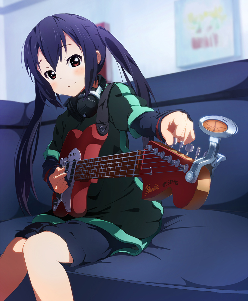 black_hair blush brown_eyes bun150 casual couch foreshortening guitar headphones headphones_around_neck instrument k-on! long_hair nakano_azusa shorts sitting smile solo sony twintails