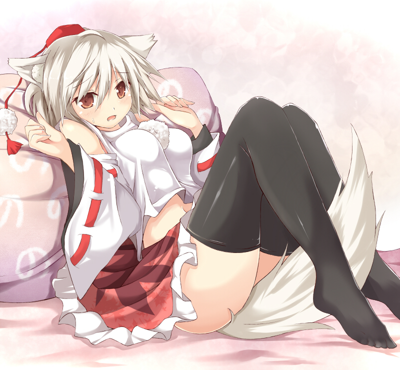 animal_ears between_legs black_legwear blush breasts cushion detached_sleeves efe face feet hat inubashiri_momiji large_breasts midriff navel no_panties open_mouth red_eyes red_skirt shirt silver_hair sitting skirt solo tail tail_between_legs tassel thighhighs touhou upskirt white_shirt wolf_ears wolf_tail