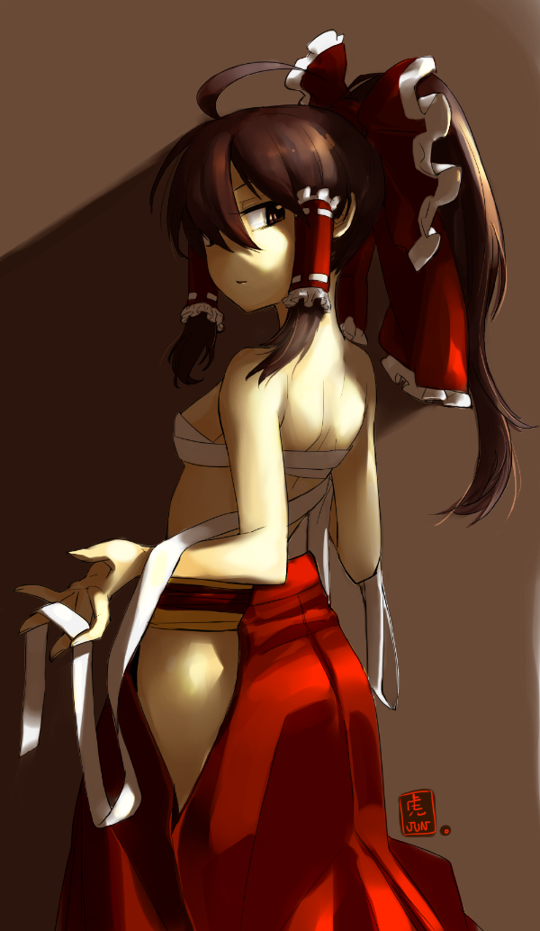 ahoge back bad_id bare_back bare_shoulders bow breasts brown_eyes brown_hair dark_room from_behind hair_bow hair_tubes hakama hakurei_reimu japanese_clothes looking_back no_shirt ponytail sarashi sideboob solo standing topless tora_jun touhou undone_sarashi undressing