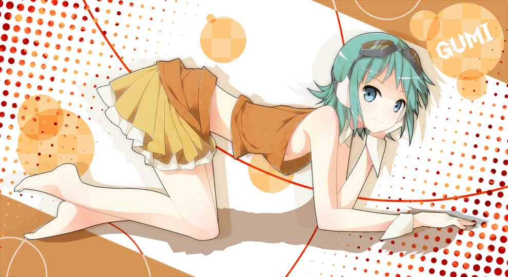 1girl all_fours bad_id barefoot character_name chin_rest dress gingami goggles goggles_on_head green_eyes green_hair gumi nagomi_no_ame orange_dress short_hair skirt smile solo vocaloid wrist_cuffs