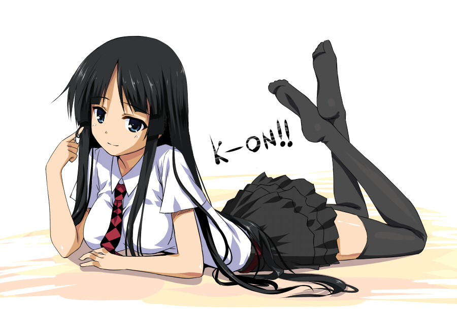 1girl akiyama_mio bangs black_hair black_legwear blue_eyes blunt_bangs breasts feet frills gathers hime_cut k-on! large_breasts legs long_hair lying necktie on_stomach senji_(tegone_spike) simple_background smile solo thigh-highs thighhighs tsurime very_long_hair zettai_ryouiki