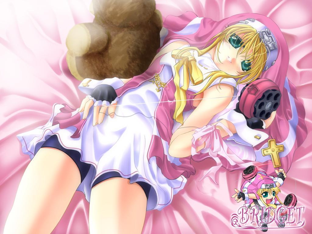 alternate_color aqua_eyes bed blonde_hair bridget bridget_(guilty_gear) crossdressing crossdressinging green_eyes guilty_gear jpeg_artifacts lying on_back pink player_2 stuffed_animal stuffed_toy teddy_bear trap yoyo