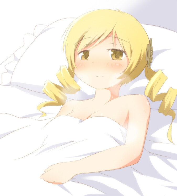 bare_shoulders bed blanket blonde_hair blush breasts breath cleavage drill_hair hair_ornament mahou_shoujo_madoka_magica pillow ran_(9ens2000) smile solo tomoe_mami twin_drills under_covers yellow_eyes