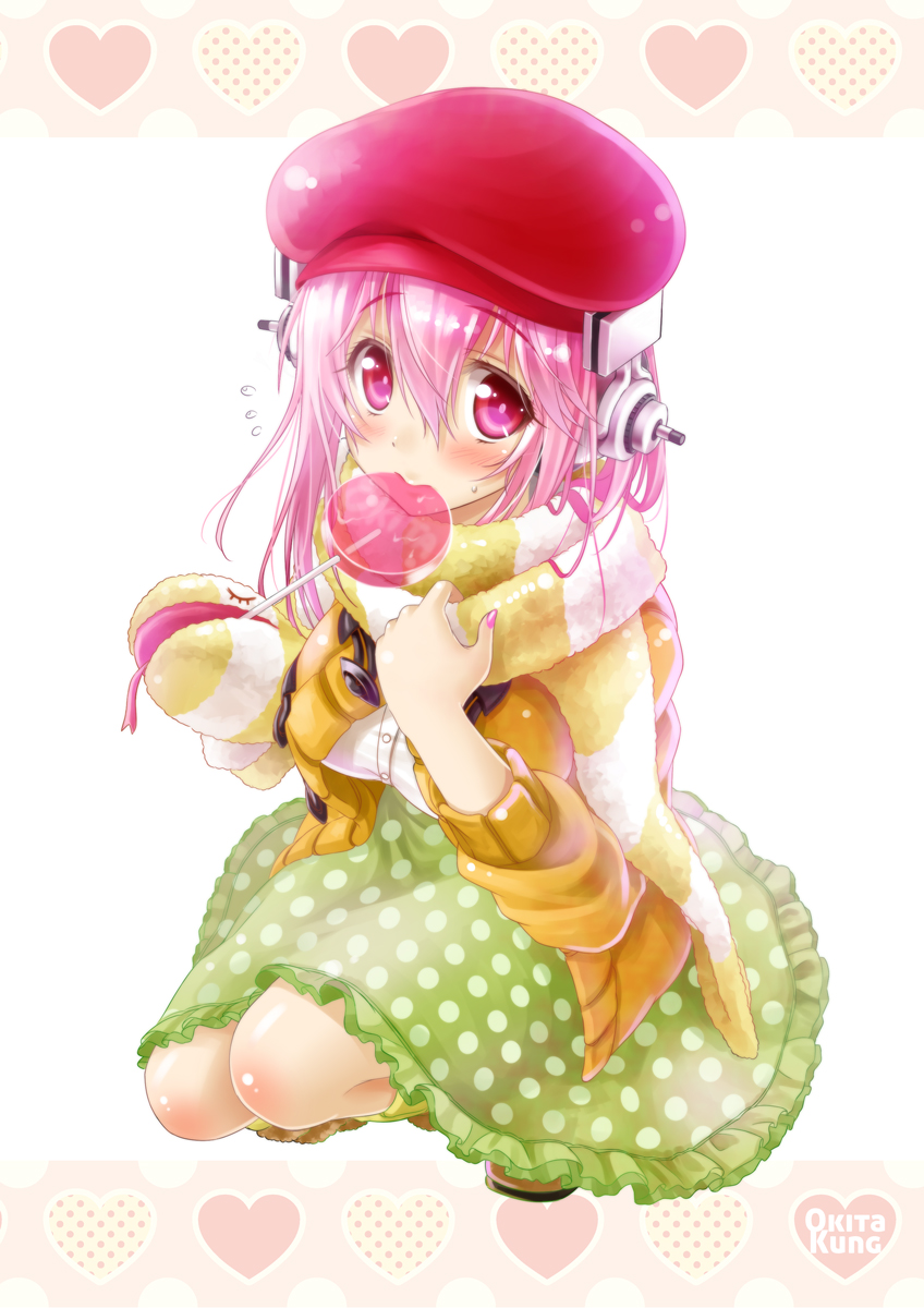 1girl artist_name blush candy dress flying_sweatdrops hat headphones heart highres lollipop looking_at_viewer mouth_hold nail_polish nitroplus okitakung pink_eyes pink_hair polka_dot polka_dot_dress scarf simple_background solo squatting striped striped_scarf super_sonico sweatdrop white_background