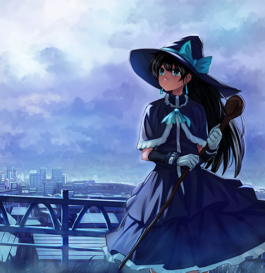 1girl aqua_eyes black_hair building bukimi_isan capelet clouds ganaha_hibiki gloves hat highres idolmaster long_hair sky solo staff witch_hat