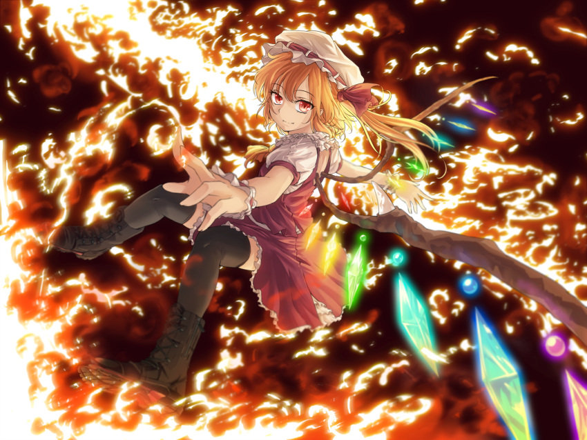 1girl ascot black_legwear blonde_hair boots fire flame flandre_scarlet freeze-ex hat laevatein red_eyes short_hair side_ponytail skirt skirt_set smile solo thighhighs touhou wings wrist_cuffs