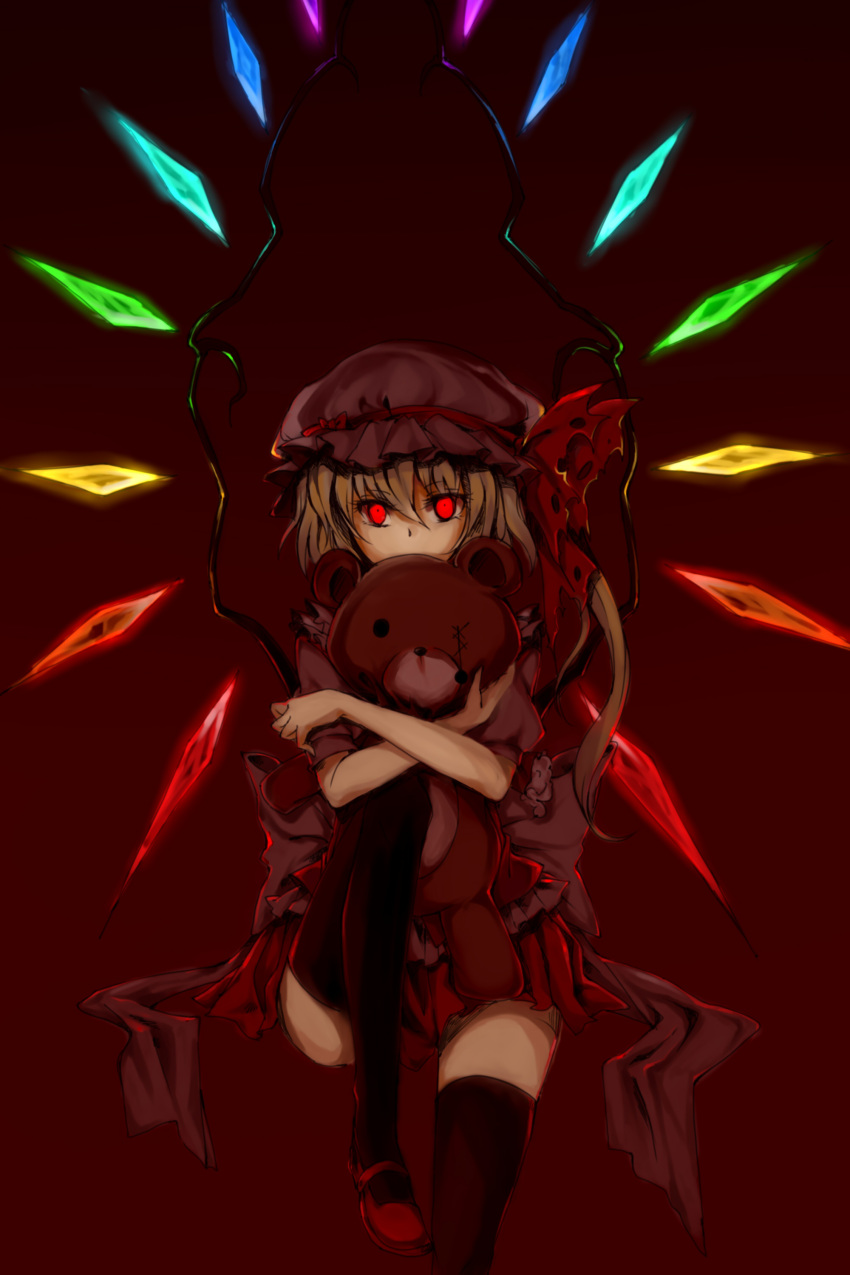 1girl absurdres blonde_hair damaged flandre_scarlet highres looking_at_viewer red red_background red_clothes red_eyes short_hair simple_background stuffed_animal stuffed_toy teddy_bear thighhighs torn_ribbon touhou toy wings zettai_ryouiki