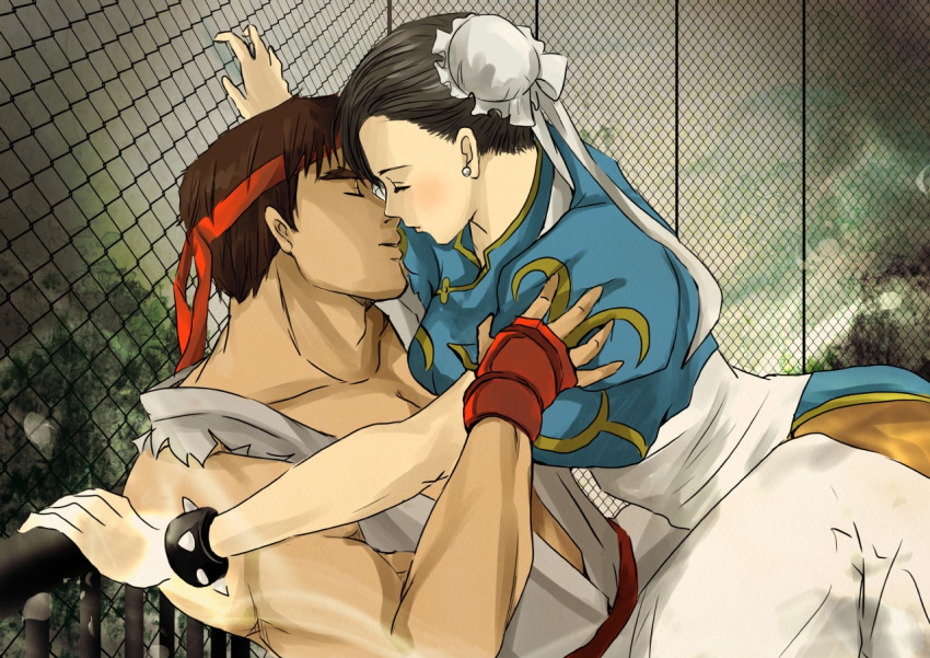 1boy 1girl against_fence black_hair bracelet brown_legwear bun_cover chain-link_fence china_dress chinese_clothes chun-li closed_eyes couple double_bun dougi earrings fence girl_on_top hayame_(m_ayame) hetero incipient_kiss jewelry pantyhose ryuu_(street_fighter) sash spiked_bracelet spikes street_fighter
