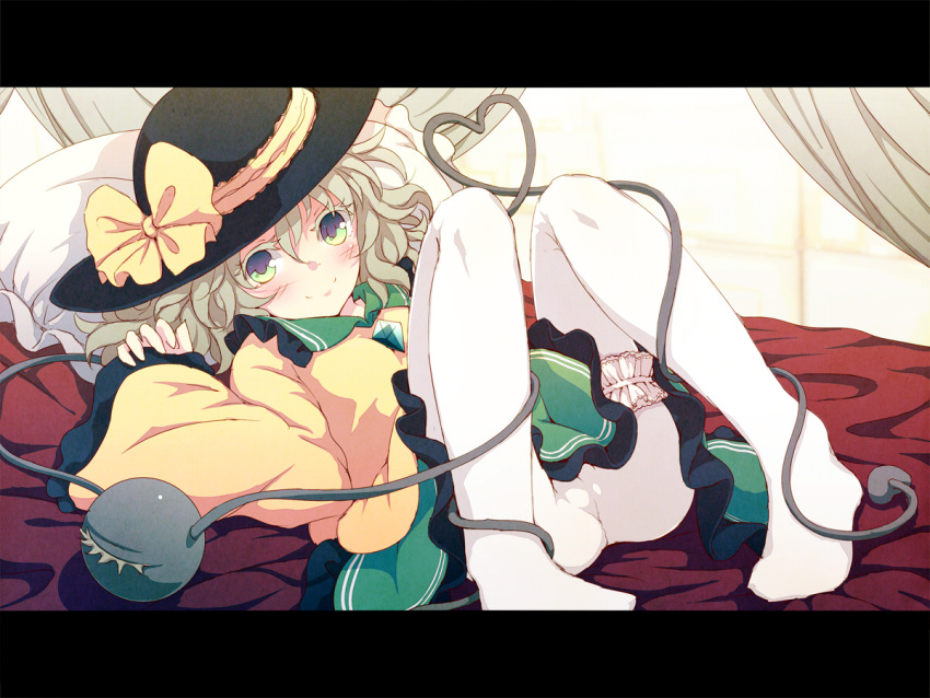 1girl blush bow canopy_bed dise green_eyes hat hat_bow heart heart_of_string komeiji_koishi long_sleeves looking_at_viewer lying on_back on_bed pantyhose pillow shirt silver_hair skirt smile solo spread_legs third_eye touhou white_legwear wide_sleeves